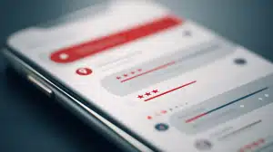 Phone screen showing customer review ratings. Multi-location Local SEO.